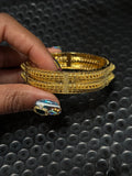 GOLD BANGLES